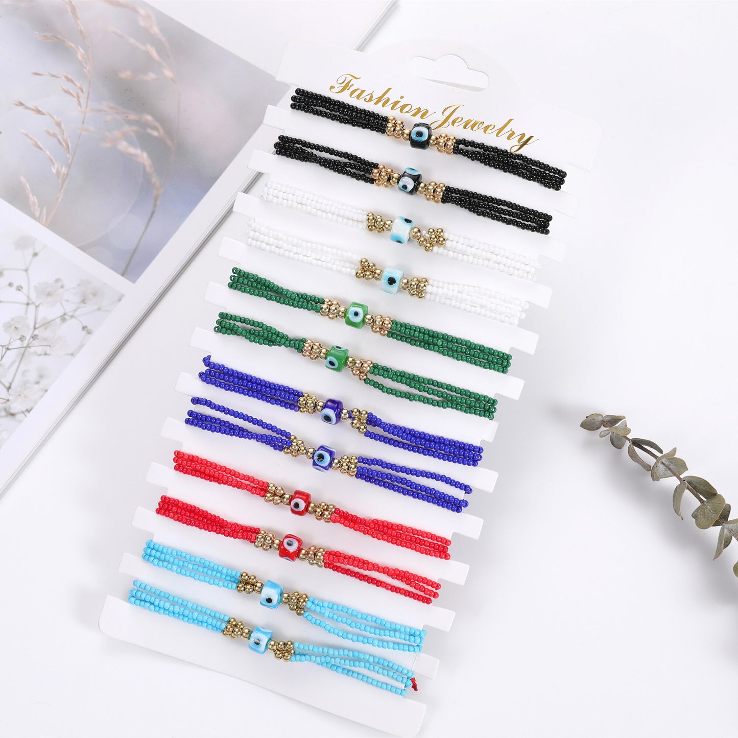 12Pcs Evil Eye Charm Bracelet Unisex Multilayer Rice Beads Braided Rope Charm Friendship Bracelet Jewelry Gift Wholesale