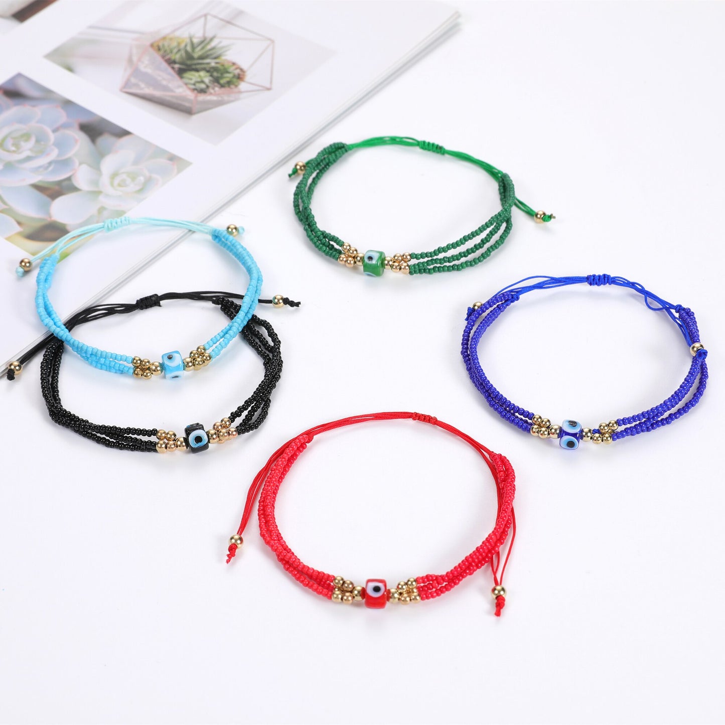 12Pcs Evil Eye Charm Bracelet Unisex Multilayer Rice Beads Braided Rope Charm Friendship Bracelet Jewelry Gift Wholesale